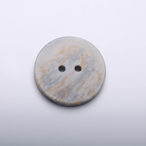 > imitation stone button