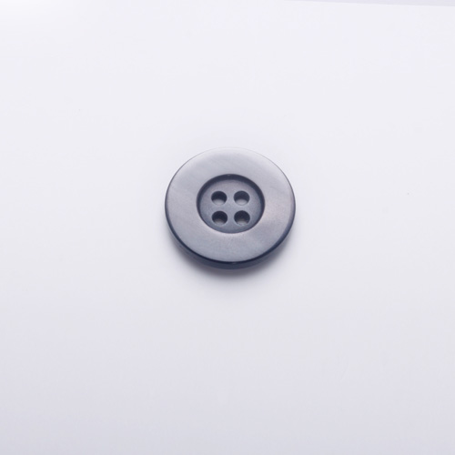 > imitation shell button