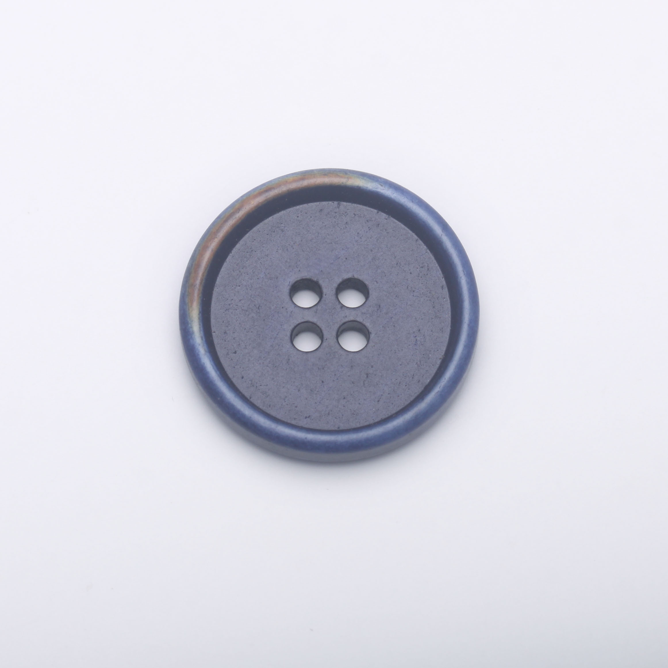 > bone button with burnt effect